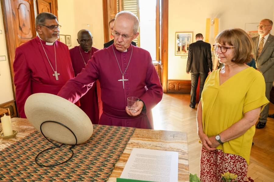 The Most Revd Justin Welby, Archbishop of Canterbury talks with artist Rebecca Cottrell at The Anglican Centre in Rome at the opening of John Moorman Memorial Library exhibition.