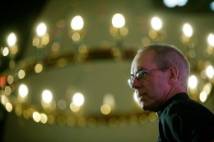 Archbishop of Canterbury with candles in the background