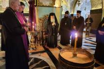 Archbishop Justin and Patriarch Theophilus praying in Church of Holy Sepulchre
