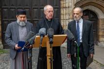 The Most Revd Justin Welby, Archbishop of Canterbury, Sheikh Ibrahim Mogra and Rabbi Jonathon Wittenberg join together outside Lambeth Palace to deliver statements rejecting anti-semitism and hate crimes of all sorts with special reference to tensions and emotions around the current situation in the Middle East. 