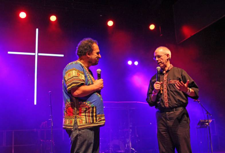 Archbishop Justin on stage with Soul Survivor founder Mike Pilavachi.