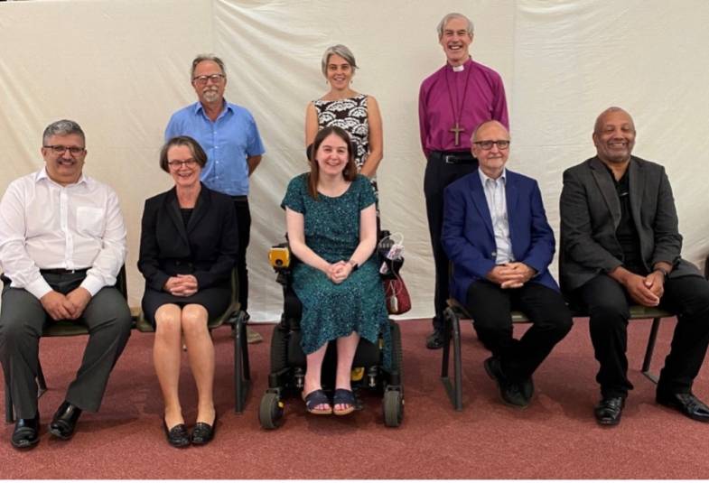 The Reimagining Care Commissioners posing for a photograph at one of their meetings in 2021.