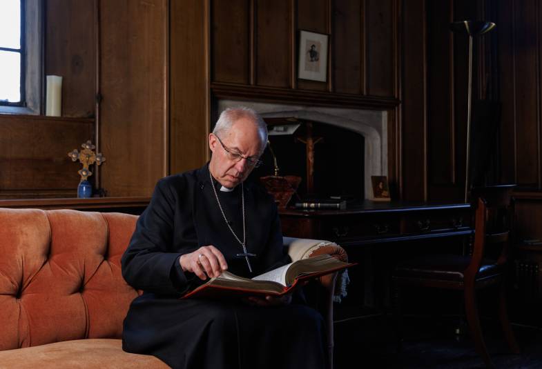 Archbishop Justin reading the Coronation Bible