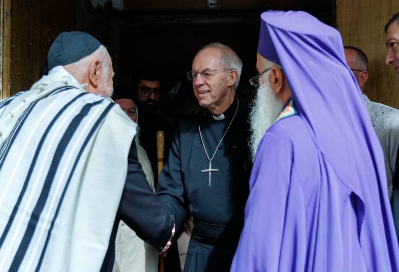 Archbishop Justin is welcomed at The Peace Cathedral in Tbilisi by Malkhaz Songulashvili, Metropolitan Bishop of Tbilisi, as he introduces him to members of various local faith communities.  