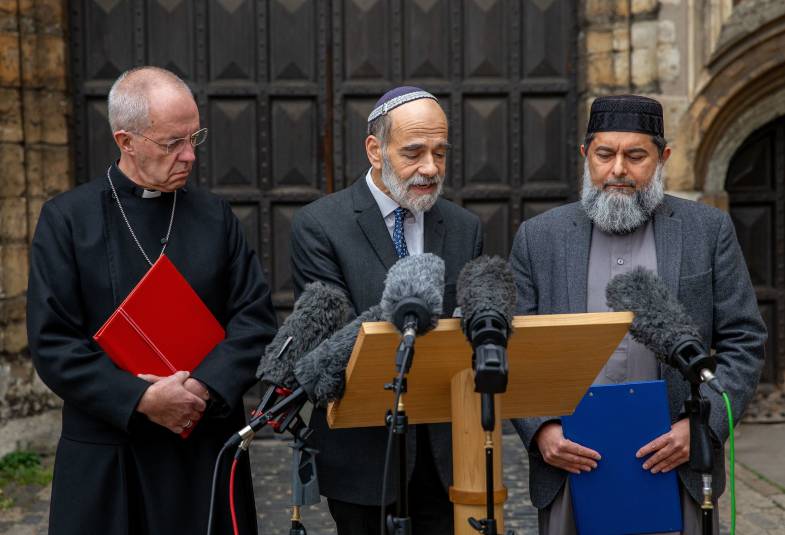 The Most Revd Justin Welby, Archbishop of Canterbury, Sheikh Ibrahim Mogra and Rabbi Jonathan Wittenberg join together outside Lambeth Palace to deliver statements rejecting antisemitism and hate crimes of all sorts with special reference to tensions and emotions around the current situation in the Middle East. 