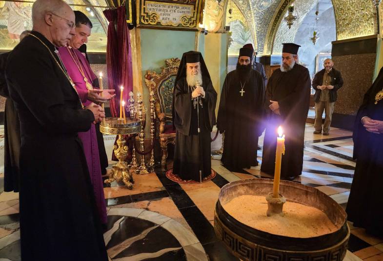 Archbishop Justin and Patriarch Theophilus praying in Church of Holy Sepulchre