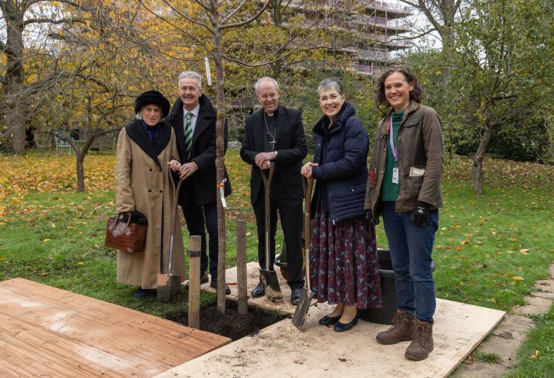 Penny Snell, London County Organiser NGS, Rupert Tyler, Chairman NGS, The Most Revd Justin Welby, Archbishop of Canterbury, Caroline Welby and Lambeth Palace Head Gardener Lindsey Schulman plant a new Cherry Tree Prunus Accolade in the Wash House Garden at Lambeth Palace as part of the National Garden Scheme.