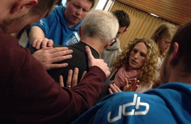 Archbishop Justin is prayed for by youthworkers in Birmingham, February 2015