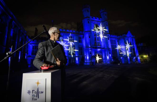 Justin Welby and the Community of St Anselm with the Lambeth Palace Christmas lights
