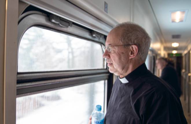 The Most Revd Justin Welby, Archbishop of Canterbury, on board a train from Warsaw to Chelm on his way to Ukraine for a five-day visit. Photo: Lambeth Palace, 5 February 2024. 